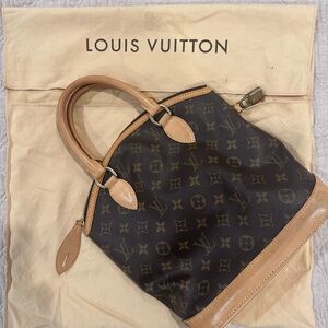 Louis Vuitton Lockit Veryicle Monogram handbag